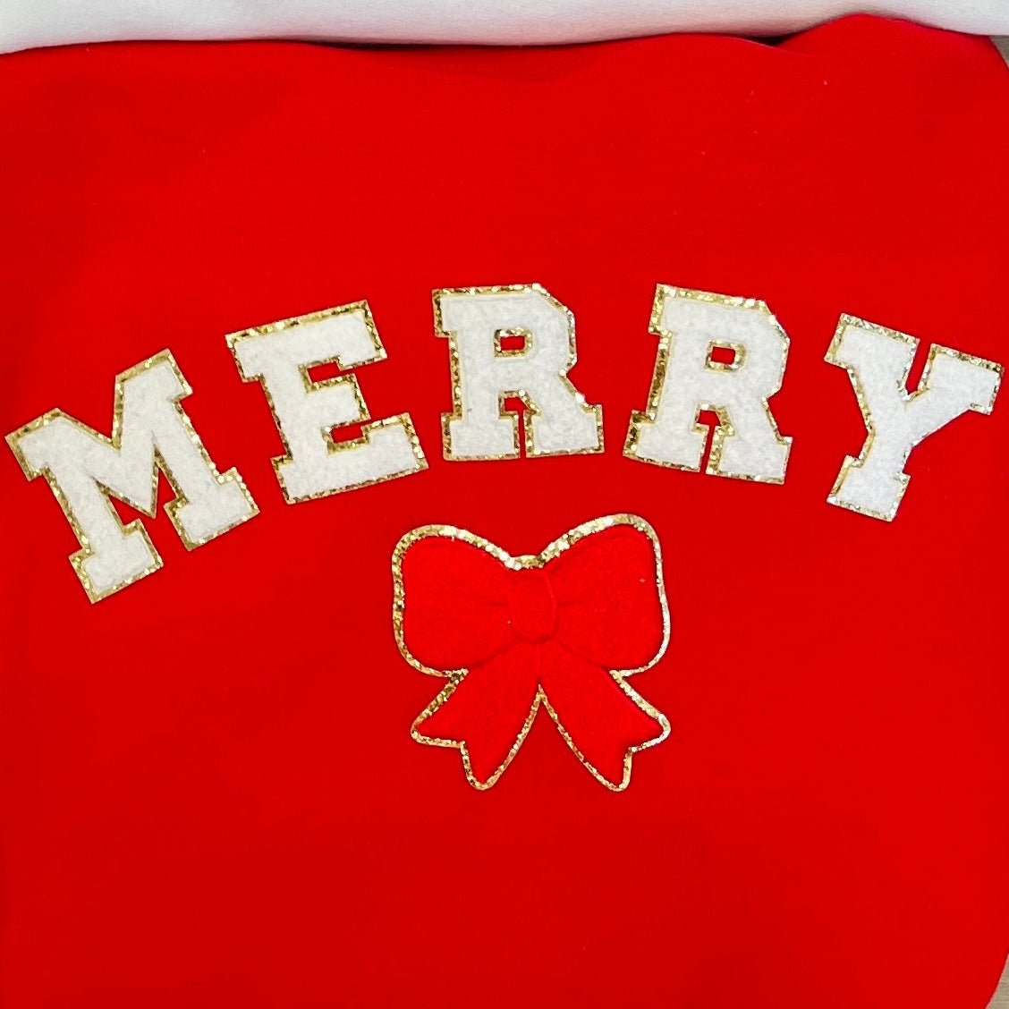 ‘MERRY’ Chenille Patch Bow Sweatshirt - United Monograms